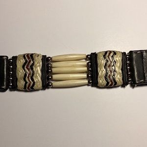 30” Leather belt w stitching & faux bone. Black with silver buckle.